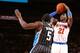 NEW YORK, NY - DECEMBER 6: Iman Shumpert #21 of the New York Knicks shoots against the Orlando Magic during a game at Madison Square Garden in New York City on December 6, 2013. NOTE TO USER: User expressly acknowledges and agrees that, by downloading an