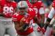 Nov 23, 2013; Columbus, OH, USA; Ohio State Buckeyes running back Carlos Hyde (34) runs the ball in pre game warmups before the game against the Indiana Hoosiers at Ohio Stadium. Ohio State Buckeyes beat Indiana Hoosiers 42-14. Mandatory Credit: Trevor Ru