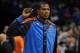 Nov 27, 2013; Oklahoma City, OK, USA; Oklahoma City Thunder small forward Kevin Durant (35) watches his teammates warm up prior to action against the San Antonio Spurs at Chesapeake Energy Arena. Mandatory Credit: Mark D. Smith-USA TODAY Sports