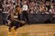 PORTLAND, OR - DECEMBER 2: Paul George #24 of the Indiana Pacers kneels on the court against the Portland Trail Blazers on December 2, 2013 at the Moda Center Arena in Portland, Oregon. NOTE TO USER: User expressly acknowledges and agrees that, by downlo