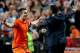 AMSTERDAM, NETHERLANDS - OCTOBER 11: Robin van Persie of Holland celebrates with Patrick Kluivert after scoring their fourth goal during the FIFA 2014 World Cup Qualifing match between Holland and Hungary at Amsterdam Arena on October 11, 2013 in Amsterd