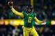 EUGENE, OR - NOVEMBER 29: Quarterback Marcus Mariota #8 of the Oregon Ducks throws a pass against the Oregon State Beavers during the 117th playing of the Civil War on November 29, 2013 at the Autzen Stadium in Eugene, Oregon. (Photo by Jonathan Ferrey/