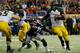 ATLANTA, GA - DECEMBER 07: Quarterback James Franklin #1 of the Missouri Tigers runs in a two-point conversion past Chris Davis #11 of the Auburn Tigers in the third quarter during the SEC Championship Game at Georgia Dome on December 7, 2013 in Atlanta,