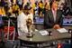 MIAMI, FL - JUNE 20: LeBron James #6 of the Miami Heat, sitting with the Bill Russell NBA Finals Most Valuable Player (MVP) trophy, is interviewed by NBA legend Magic Johnson following the Heat's victory against the San Antonio Spurs in Game Seven of the