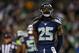 SEATTLE, WA - DECEMBER 02: Cornerback Richard Sherman #25 of the Seattle Seahawks responds to the cheering crowd during the game against the New Orleans Saints at CenturyLink Field on December 2, 2013 in Seattle, Washington. (Photo by Otto Greule Jr/Getty