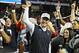 Dec 7, 2013; Atlanta, GA, USA; Auburn Tigers head coach Gus Malzahn celebrates after defeating the Missouri Tigers in the 2013 SEC Championship game at Georgia Dome. Auburn defeated Missouri 59-42. Mandatory Credit: Dale Zanine-USA TODAY Sports