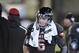 DEKALB, IL - NOVEMBER 26: Quarterback Jordan Lynch #6 of the Northern Illinois Huskies stands on the sidelines as the defense is on the field during the fourth quarter against the Western Michigan Broncos at Huskie Stadium on November 26, 2013 in DeKalb,