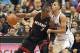 Dec 7, 2013; Minneapolis, MN, USA; Miami Heat shooting guard Dwyane Wade (3) looks to get around Minnesota Timberwolves shooting guard Kevin Martin (23) in the second half at Target Center. The Heat won 103-82. Mandatory Credit: Jesse Johnson-USA TODAY Sp