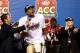 CHARLOTTE, NC - DECEMBER 07: Quarterback Jameis Winston #5 of the Florida State Seminoles celebrates on stage after defeating the Duke Blue Devils 45-7 in the ACC Championship game at Bank of America Stadium on December 7, 2013 in Charlotte, North Caroli