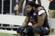 DETROIT, MI - DECEMBER 6: Defensive tackle Ken Bishop #93 of the Northern Illinois Huskies sits on the bench after a 47-27 loss to the Bowling Green Falcons in the MAC Championship at Ford Field on December 6, 2013 in Detroit, Michigan. (Photo by Duane Bu