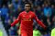 LIVERPOOL, ENGLAND - NOVEMBER 23: Daniel Sturridge of Liverpool celebrates scoring his team's third goal during the Barclays Premier League match between Everton and Liverpool at Goodison Park on November 23, 2013 in Liverpool, England. (Photo by Alex L