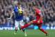 LIVERPOOL, ENGLAND - NOVEMBER 23: Seamus Coleman of Everton competes with Coutinho of Liverpool during the Barclays Premier League match between Everton and Liverpool at Goodison Park on November 23, 2013 in Liverpool, England. (Photo by Clive Brunskill
