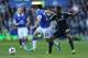 LIVERPOOL, ENGLAND - SEPTEMBER 14: Seamus Coleman of Everton holds off Samuel Eto'o of Chelsea during the Barclays Premier League match between Everton and Chelsea at Goodison Park on September 14, 2013 in Liverpool, England. (Photo by Clive Brunskill/G