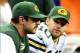 Nov 28, 2013; Detroit, MI, USA; Green Bay Packers quarterback Aaron Rodgers (left) sits on the bench next to quarterback Matt Flynn (10) during the fourth quarter of a NFL football game against the Detroit Lions on Thanksgiving at Ford Field. Mandatory Cr