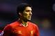 LIVERPOOL, ENGLAND - DECEMBER 07: Luis Suarez of Liverpool looks on during the Barclays Premier League match between Liverpool and West Ham United at Anfield on December 7, 2013 in Liverpool, England. (Photo by Clive Brunskill/Getty Images)