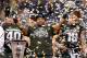 INDIANAPOLIS, IN - DECEMBER 07: Denicos Allen #28 of the Michigan State Spartans holds up the Big Ten championship trophy after defeating the Ohio State Buckeyes 34-24 at the Big 10 Conference Championship Game at Lucas Oil Stadium on December 7, 2013 in