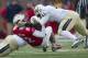 DALLAS, TX - DECEMBER 7: Neal Burcham #12 of the SMU Mustangs is tackled short of the first down in the fourth quarter by the Central Florida Knights resulting in a turnover on downs on December 7, 2013 at Gerald J. Ford Stadium in Dallas, Texas. (Photo