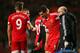 SOUTHAMPTON, ENGLAND - DECEMBER 07: Dejan Lovren of Southampton is helped with an injury during the Barclays Premier League match between Southampton and Manchester City at St Mary's Stadium on December 7, 2013 in Southampton, England. (Photo by Bryn Len