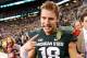 INDIANAPOLIS, IN - DECEMBER 07: Connor Cook #18 of the Michigan State Spartans celebrates a 34-24 win over the Ohio State Buckeyes at the Big 10 Conference Championship Game at Lucas Oil Stadium on December 7, 2013 in Indianapolis, Indiana. (Photo by Gre