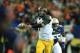 Dec 7, 2013; Atlanta, GA, USA; Missouri Tigers quarterback James Franklin (1) looks to throw chased by Auburn Tigers defensive end Carl Lawson (55) in the first quarter during the 2013 SEC Championship game at Georgia Dome.. Mandatory Credit: Daniel Shire