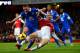 LONDON, ENGLAND - DECEMBER 08: Per Mertesacker of Arsenal clashes with James McCarthy of Everton during the Barclays Premier League match between Arsenal and Everton at Emirates Stadium on December 8, 2013 in London, England. (Photo by Michael Regan/Get