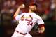 ST LOUIS, MO - OCTOBER 11: John Axford #34 of the St. Louis Cardinals pitches in the 11th inning against the Los Angeles Dodgers during Game One of the National League Championship Series at Busch Stadium on October 11, 2013 in St Louis, Missouri. (Phot