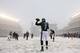 PHILADELPHIA, PA - DECEMBER 8: Quarterback Michael Vick #7 of the Philadelphia Eagles warms up in the snow before the start of a game against the Detroit Lions at Lincoln Financial Field on December 8, 2013 in Philadelphia, Pennsylvania. (Photo by Rich Sc