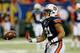 ATLANTA, GA - DECEMBER 07: Running back Tre Mason #21 of the Auburn Tigers warms-up before playing the Missouri Tigers during the SEC Championship Game at Georgia Dome on December 7, 2013 in Atlanta, Georgia. (Photo by Kevin C. Cox/Getty Images)