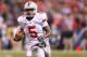 INDIANAPOLIS, IN - DECEMBER 07: Quarterback Braxton Miller #5 of the Ohio State Buckeyes looks to run during the Big Ten Conference Championship game against the Michigan State Spartans at Lucas Oil Stadium on December 7, 2013 in Indianapolis, Indiana.