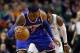 Jan 24, 2013; Boston, Massachusetts, USA; New York Knicks forward Carmelo Anthony (7) is guarded by Boston Celtics point guard Rajon Rondo (9) during the fourth quarter at TD Banknorth Garden. The New York Knicks won 89-86. Mandatory Credit: Greg M. Coo
