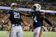 ATLANTA, GA - DECEMBER 07: Tre Mason #21 of the Auburn Tigers celebrates his fourth quarter touchdown with teammate quarterback Nick Marshall #14 against the Missouri Tigers during the SEC Championship Game at Georgia Dome on December 7, 2013 in Atlanta,