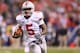 INDIANAPOLIS, IN - DECEMBER 07: Quarterback Braxton Miller #5 of the Ohio State Buckeyes looks to run during the Big Ten Conference Championship game against the Michigan State Spartans at Lucas Oil Stadium on December 7, 2013 in Indianapolis, Indiana.
