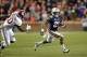 Nov 30, 2013; Auburn, AL, USA; Auburn Tigers running back Tre Mason (21) runs against Alabama Crimson Tide defensive back Jarrick Williams (20) during the third quarter at Jordan Hare Stadium. Mandatory Credit: John David Mercer-USA TODAY Sports
