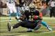 Dec 8, 2013; New Orleans, LA, USA; New Orleans Saints wide receiver Marques Colston (12) catches a pass for a touchdown in front of Carolina Panthers free safety Mike Mitchell (21) in the second quarter at Mercedes-Benz Superdome. Mandatory Credit: Crysta