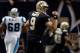 NEW ORLEANS, LA - DECEMBER 30: Drew Brees #9 of the New Orleans Saints reacts after throwing a touchdown pass to Darren Sproles #43 of the New Orleans Saints during the game against the Carolina Panthers at the Mercedes-Benz Superdome on December 30, 2