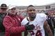 STILLWATER, OK - DECEMBER 7: Head coach Bob Stoops congratulates running back Brennan Clay #24 of the Oklahoma Sooners after the game against the Oklahoma State Cowboys December 7, 2013 at Boone Pickens Stadium in Stillwater, Oklahoma. Oklahoma defeate