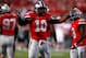 Sep 28, 2013; Columbus, OH, USA; Ohio State Buckeyes linebacker Ryan Shazier (10) pumps up the crowd during the fourth quarter against the Wisconsin Badgers at Ohio Stadium. Buckeyes beat the Badgers 31-24. Mandatory Credit: Raj Mehta-USA TODAY Sports