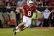 PALO ALTO, CA - NOVEMBER 30: Kevin Hogan #8 of the Stanford Cardinal runs with the ball a yard away from the endzone against the Notre Dame Fighting Irish during the second quarter at Stanford Stadium on November 30, 2013 in Palo Alto, California. Hogan