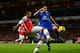 LONDON, ENGLAND - DECEMBER 08: Theo Walcott of Arsenal and Gareth Barry of Everton battle for the ball during the Barclays Premier League match between Arsenal and Everton at Emirates Stadium on December 8, 2013 in London, England. (Photo by Michael Rega