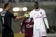 LIVORNO, ITALY - DECEMBER 07: Mario Balotelli of AC Milan reacts during the Serie A match between AS Livorno and AC Milan at Stadio Armando Picchi on December 7, 2013 in Livorno, Italy. (Photo by Gabriele Maltinti/Getty Images)