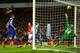 LONDON, ENGLAND - DECEMBER 08: Mesut Oezil of Arsenal scores their first goal past Tim Howard of Everton during the Barclays Premier League match between Arsenal and Everton at Emirates Stadium on December 8, 2013 in London, England. (Photo by Michael R