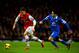 LONDON, ENGLAND - DECEMBER 08: Mesut Oezil of Arsenal is tracked by Steven Pienaar of Everton during the Barclays Premier League match between Arsenal and Everton at Emirates Stadium on December 8, 2013 in London, England. (Photo by Michael Regan/Getty