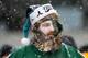 PHILADELPHIA, PA - DECEMBER 08: A Philadelphia Eagles fan watches the game in the third quarter against the Detroit Lions on December 8, 2013 at Lincoln Financial Field in Philadelphia, Pennsylvania. (Photo by Elsa/Getty Images)