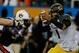 ATLANTA, GA - DECEMBER 07: Quarterback James Franklin #1 of the Missouri Tigers is rushed out of the pocket the Auburn Tigers in the second quarter of the SEC Championship Game at Georgia Dome on December 7, 2013 in Atlanta, Georgia. (Photo by Kevin C. C