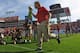 TAMPA, FL - DECEMBER 9: Former coach Jon Gruden of the Tampa Bay Buccaneers carries the Lombardi trophy to the field during half-time ceremonies as the Philadelphia Eagles play December 9, 2012 at Raymond James Stadium in Tampa, Florida. The Bucs celebrat