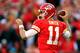 KANSAS CITY, MO - DECEMBER 01: Quarterback Alex Smith #11 of the Kansas City Chiefs passes during the game against the Denver Broncos at Arrowhead Stadium on December 1, 2013 in Kansas City, Missouri. (Photo by Jamie Squire/Getty Images)