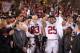 TEMPE, AZ - DECEMBER 07: Running back Tyler Gaffney #25 of the Stanford Cardinal celebrates with the Most Valuable Player trophy after defeating the Arizona State Sun Devils 38-14 in the Pac 12 Championship game at Sun Devil Stadium on December 7, 2013 i