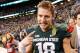 INDIANAPOLIS, IN - DECEMBER 07: Connor Cook #18 of the Michigan State Spartans celebrates a 34-24 win over the Ohio State Buckeyes at the Big 10 Conference Championship Game at Lucas Oil Stadium on December 7, 2013 in Indianapolis, Indiana. (Photo by Gre