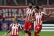 ATHENS, GREECE - SEPTEMBER 17: Vladimir Weiss of Olympiacos FC celebrates scoring a goal with his team-mates during the UEFA Champions League group stage match between Olympiacos FC and Paris Saint-Germain FC held on September 17, 2013 at the Georgios Ka