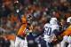 Dec 8, 2013; Denver, CO, USA; Denver Broncos quarterback Peyton Manning (18) throws the ball during the second half against the Tennessee Titans at Sports Authority Field at Mile High. The Broncos won 51-28. Mandatory Credit: Chris Humphreys-USA TODAY Sp